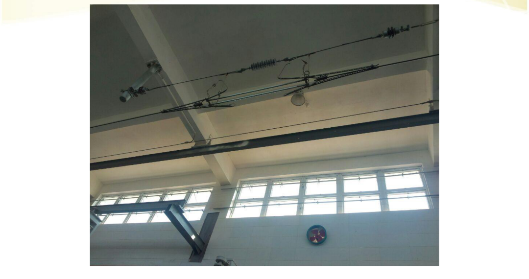 Section insulator in a depot washing shed